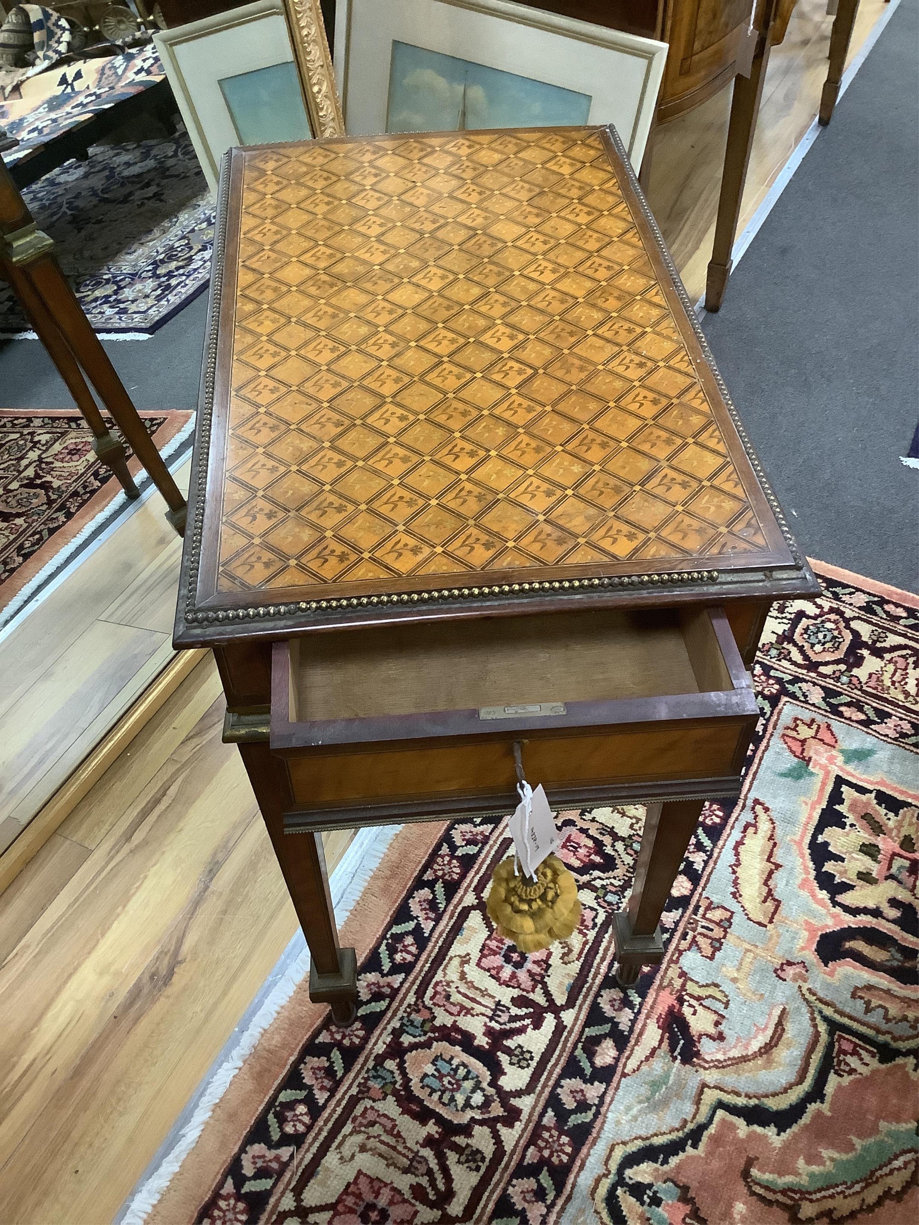 A late 19th century English Louis XVI style gilt metal mounted marquetry inlaid centre table, width 72cm, depth 44cm, height 71cm. Condition - fair